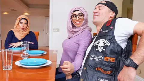 Hijab-wearing Gal Giving A Hand Job From Under The Table